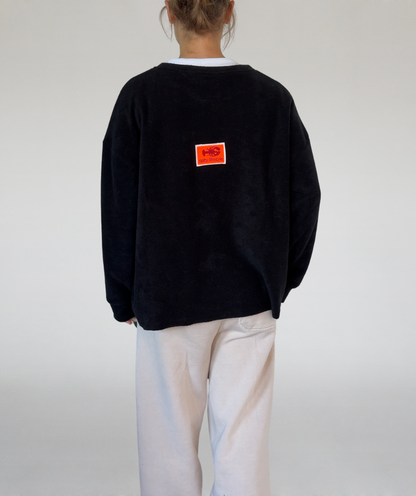Fleecesweater mit Kangurutasche schwarz „salty lifestyle“